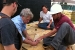 Photo of team members discussing siding details on site