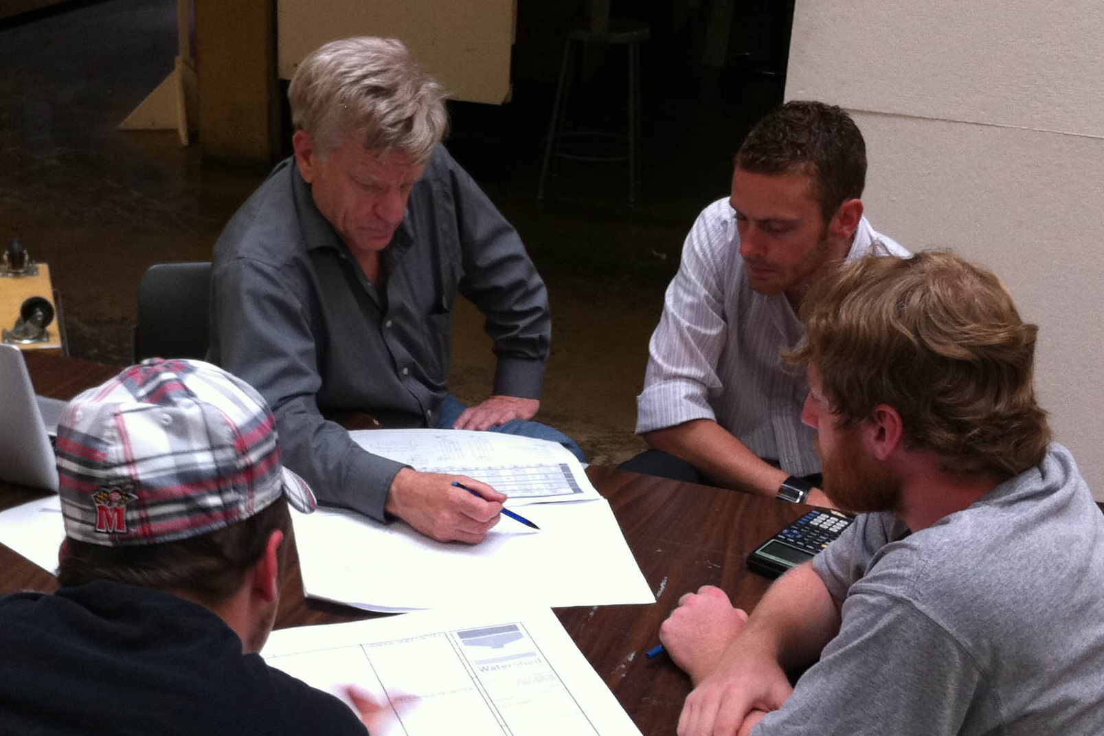 Photo of Charlie Berliner mentoring WaterShed team members