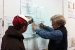 Photo of team leader and mentor discussing construction details