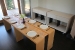 Photo of kitchen table in full dining configuration 