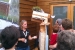 Photo of a tour guide explaining a model of our walls