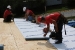Photo of Ruff Roofers installing WaterShed's metal roof