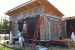 Photo of team applying Tremco waterproofing to the house