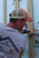Photo of construction mentor John Morris using a drill